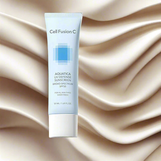 Tube of Cell Fusion C Aquatica UV Defense Sunscreen on a beige background